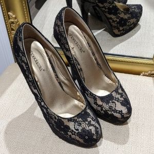 Black lace pumps
